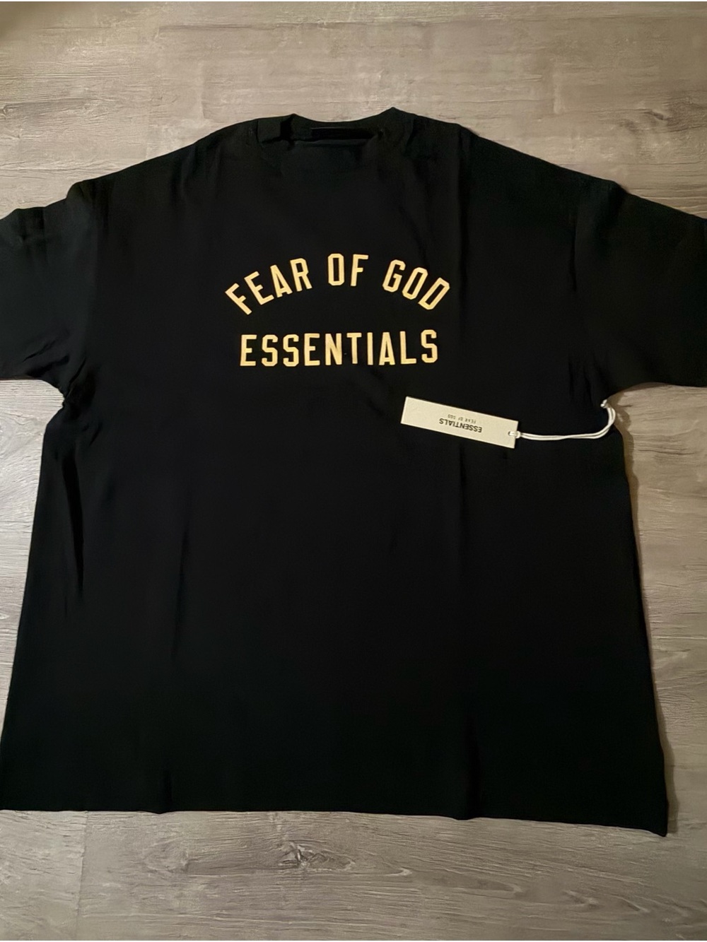 Fear of God Essentials Black Tee with Beige Logo
